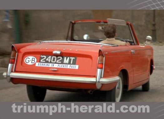 Red Triumph Herald Convertible